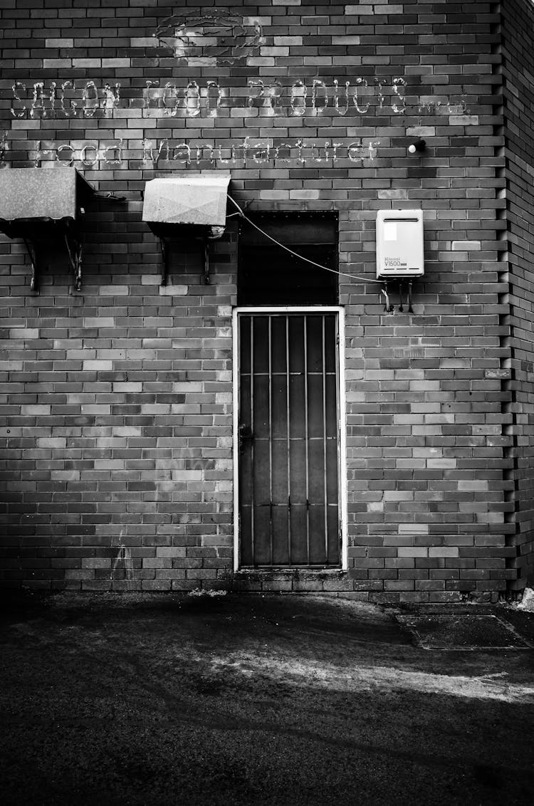 Metal Door In Brick Building