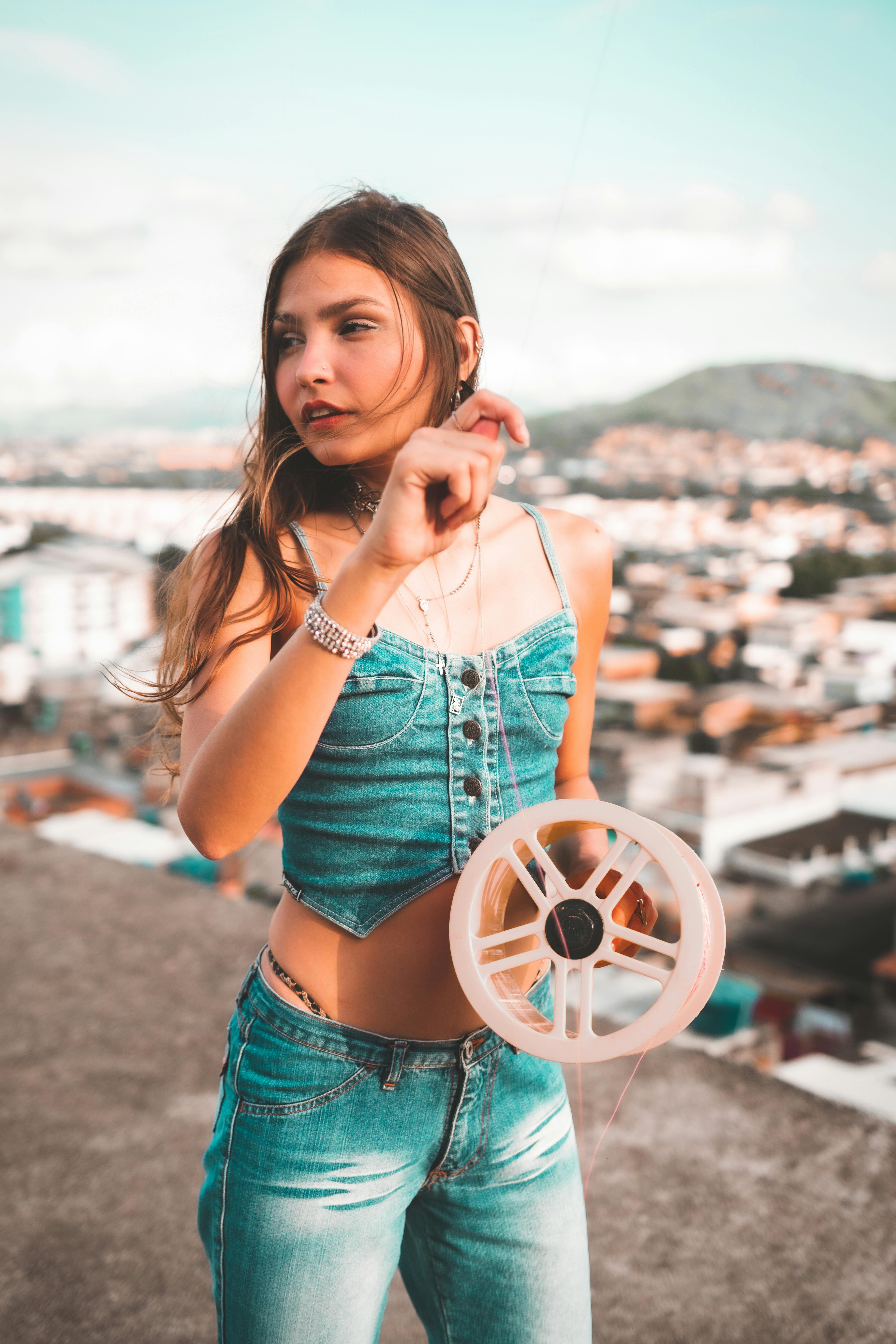 woman holding a cassette roll