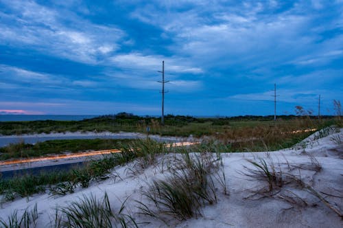 Free stock photo of dune, light streaks, pole