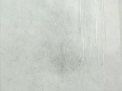  White Concrete Wall in Close Up Photography