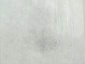 White Concrete Wall in Close Up Photography