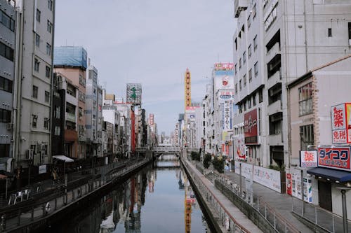 River Between Concrete Buildings 