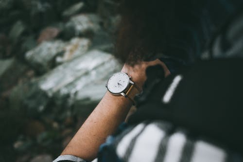 Close-up of Wristwatch on Mans Arm 