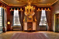 Gold and White Chandelier Near Gray Curtains