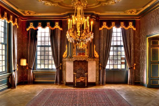 Gold and White Chandelier Near Gray Curtains