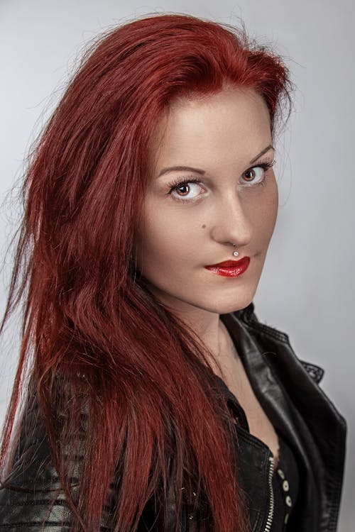 Free Woman in Red Lipstick and Black Leather Jacket Stock Photo