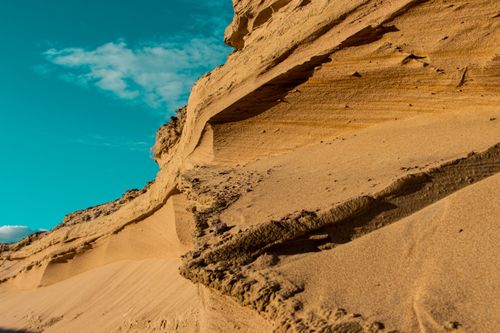 Free Dramatic sandstone formations under a clear blue sky showcasing natural geological beauty. Stock Photo
