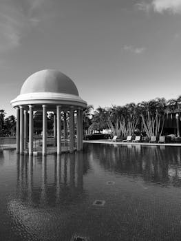 Stunning black and white photo of a dome gazebo by the pool at a resort in Varadero, Cuba.