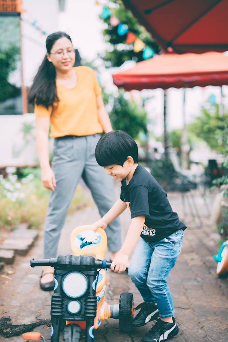 Mother With Son In Yard