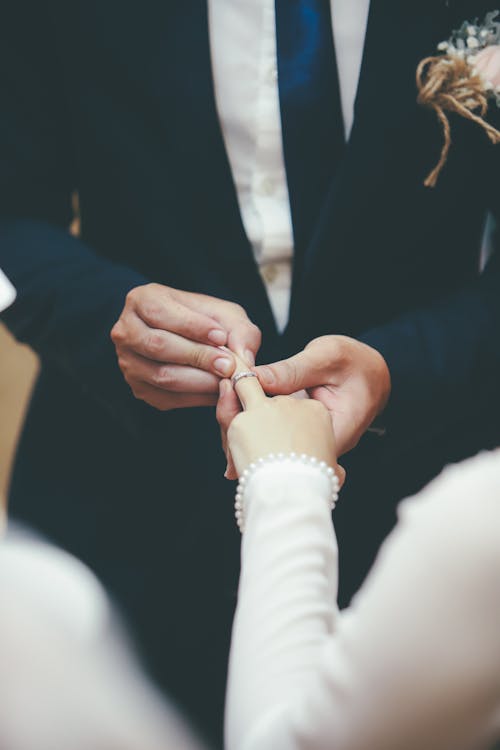 Man and Woman Holding Hands