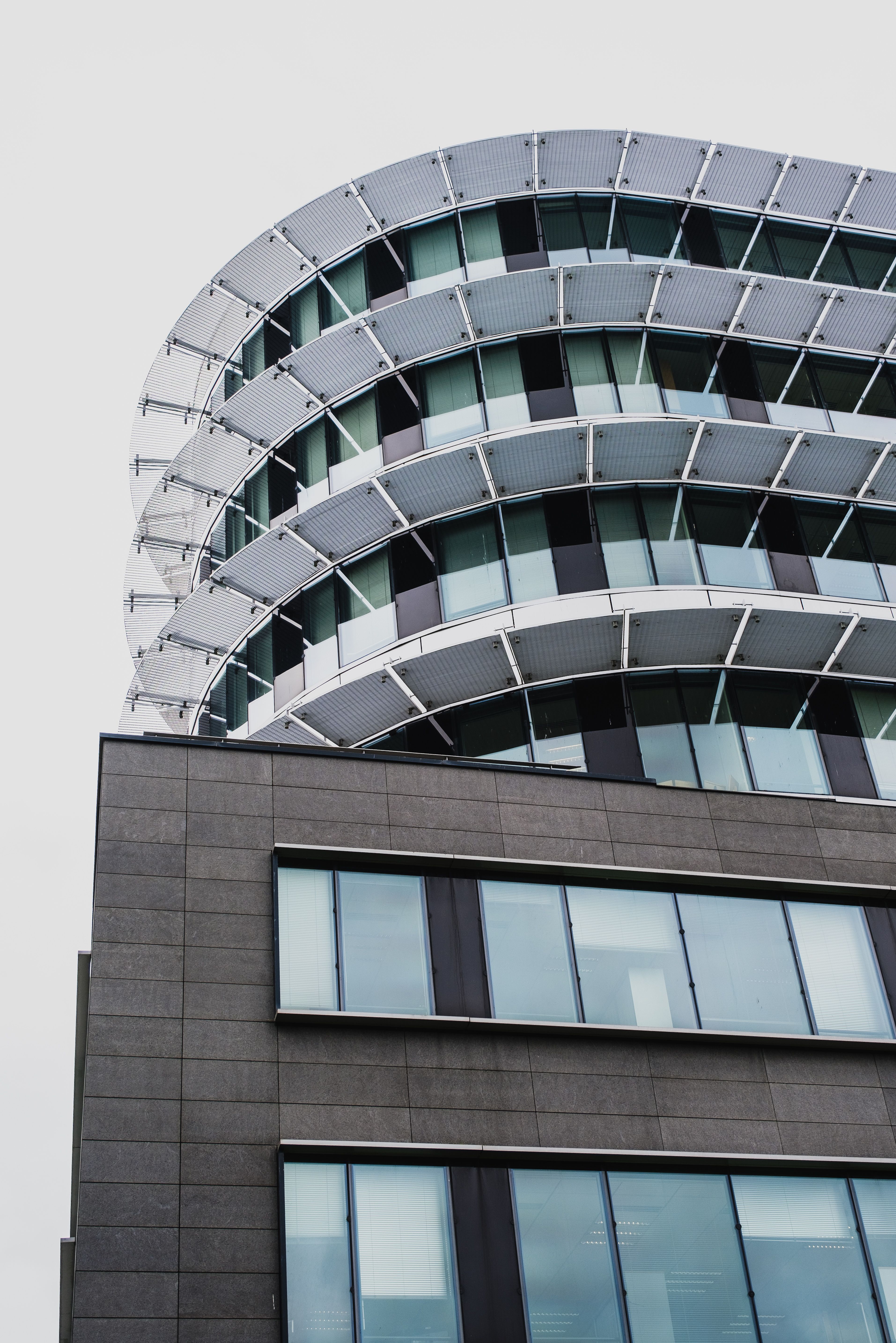 Low Angle View of Modern Buildings in City · Free Stock Photo