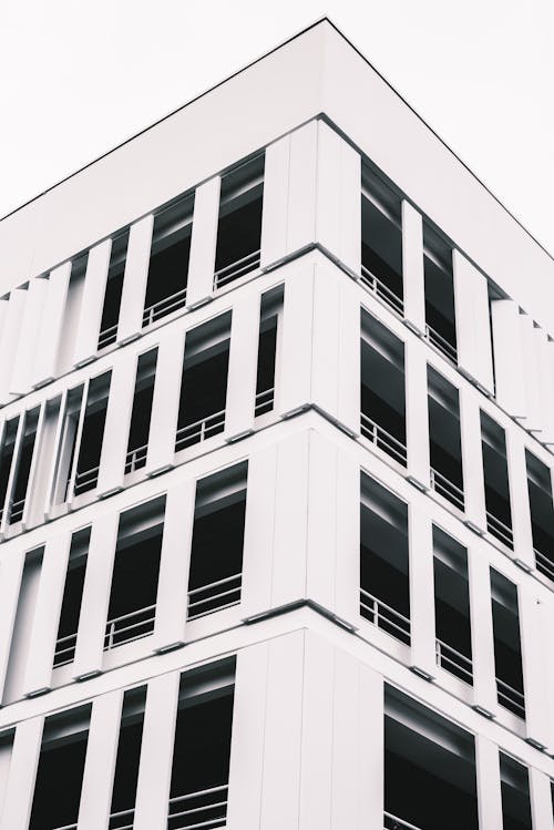 Foto d'estoc gratuïta de arquitectura moderna, bloc de pisos, cantonada