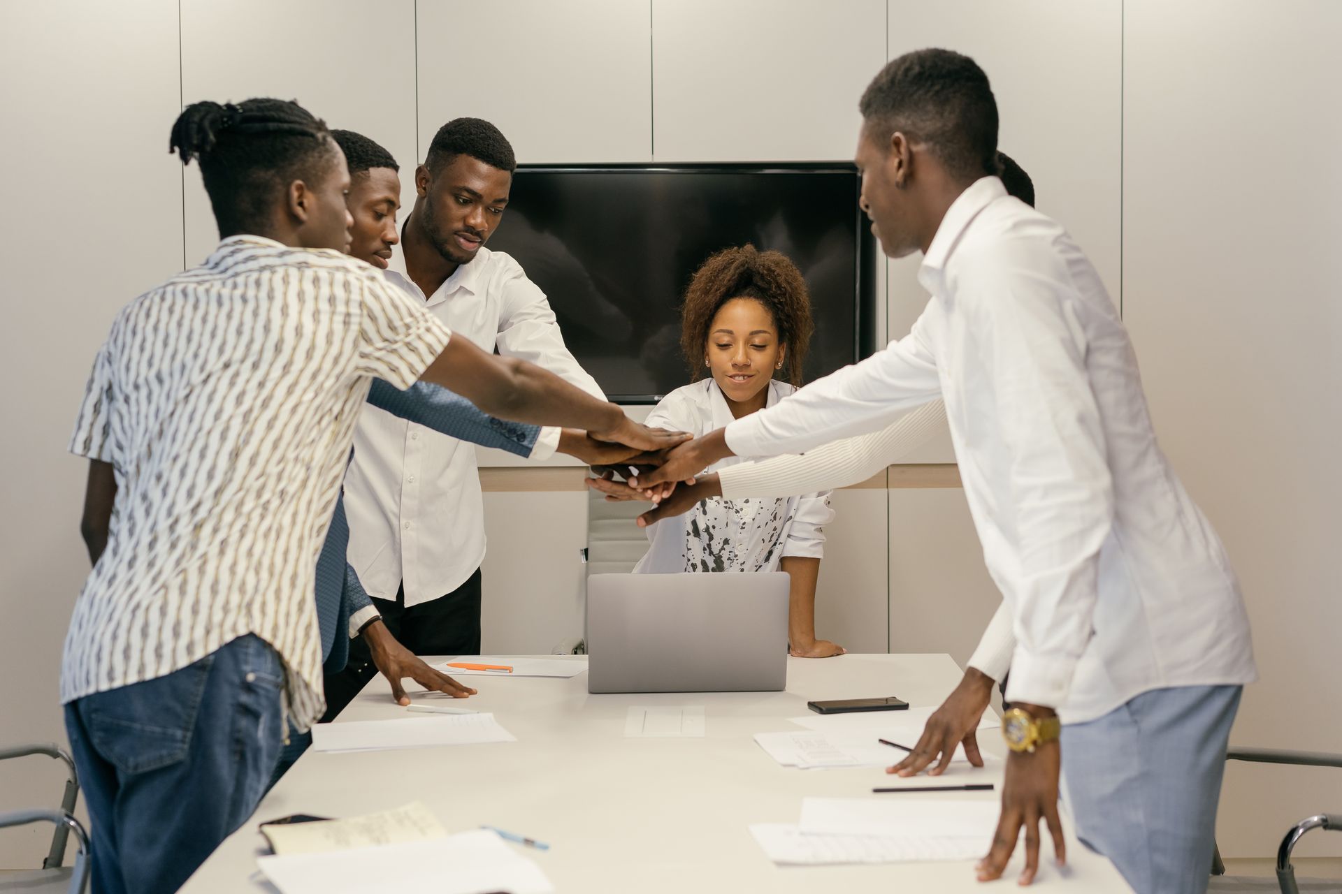 African corporate advisory team collaborating around a table in a modern Nairobi office