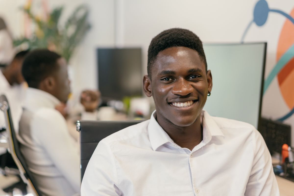 Founder speaking to camera in a studio office — photo by Mikhail Nilov on Pexels
