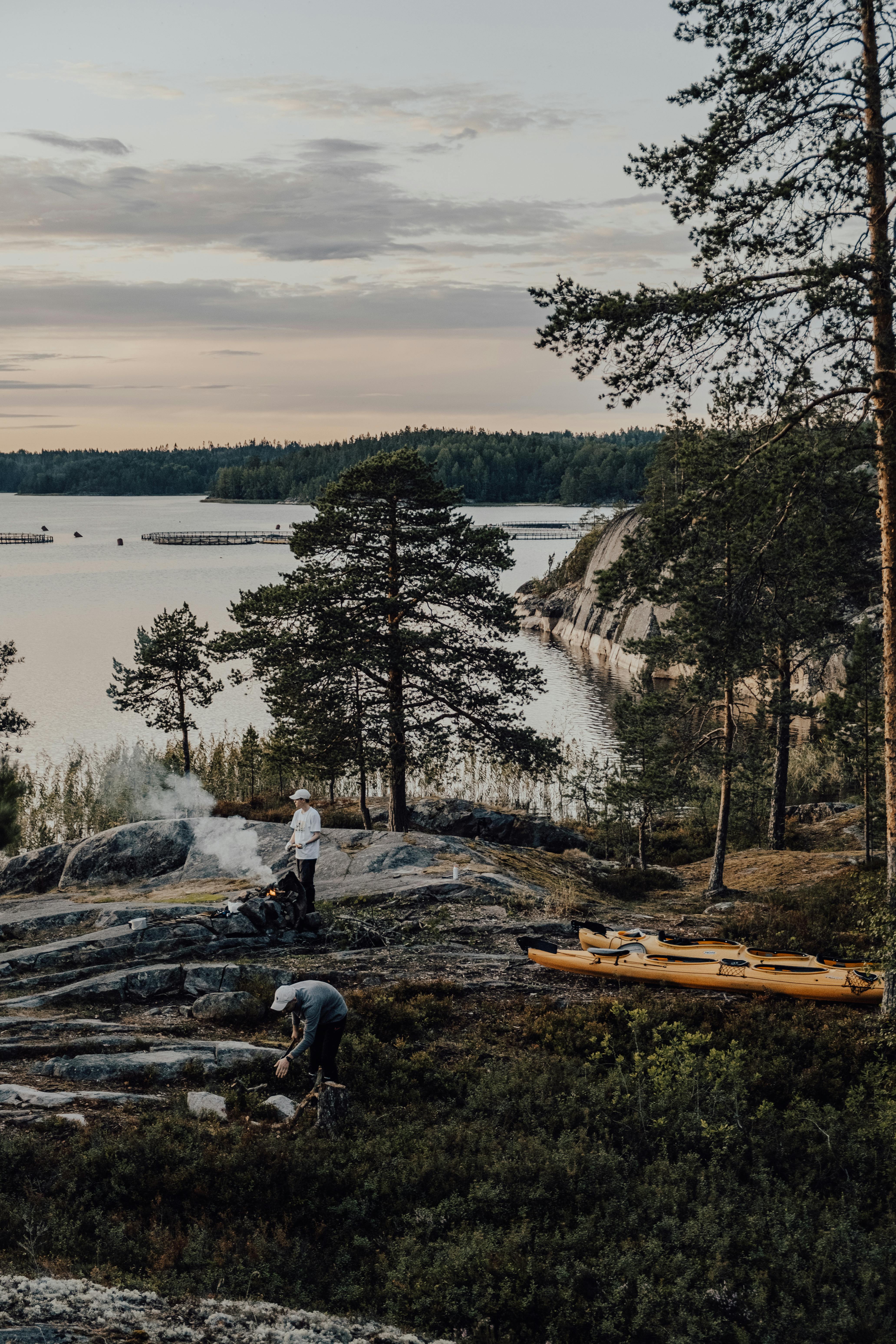Explore camping and canoes by a tranquil lake in Ruskeala, Karelia.