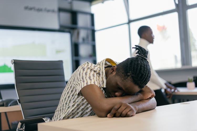 
A Man Sleeping In The Office