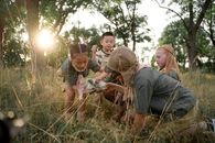 Group of Young Scouts Finding an Animal Skul