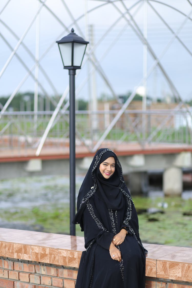 Woman In Black Hijab And Abaya