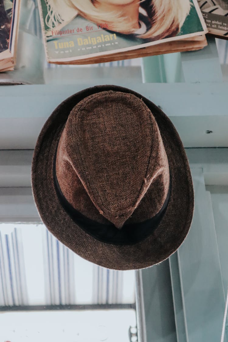 A Hanging Brown Trilby Hat 