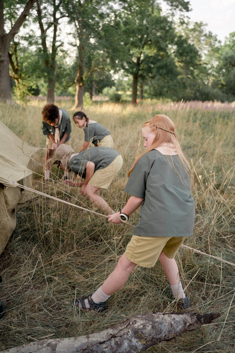 Photograph Of Scouts Setting Up A Tent