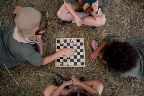 Overhead Shot of Kids Playing a Board Game