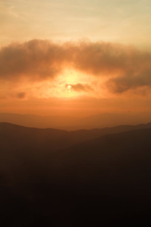 Free Silhouette of Mountains During Sunset Stock Photo