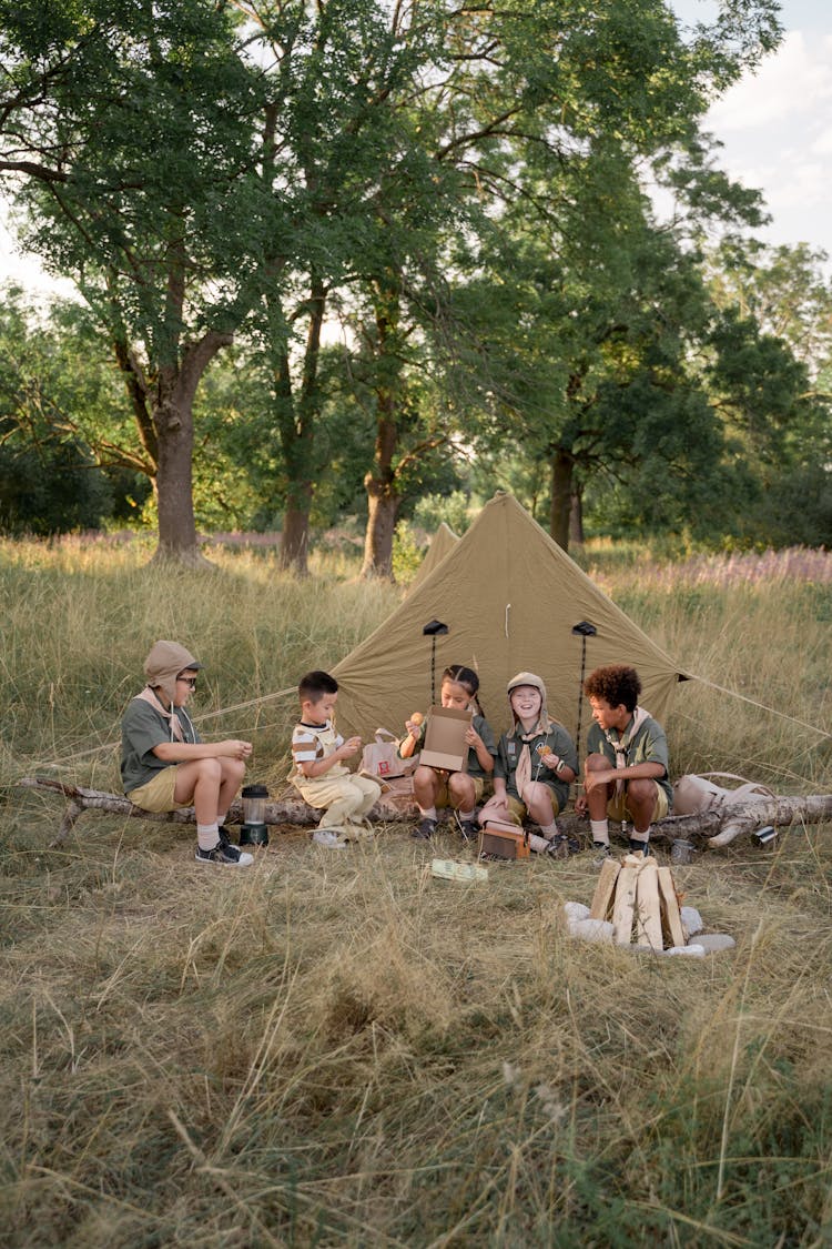 Girls And Boys Scouts Out For Camping