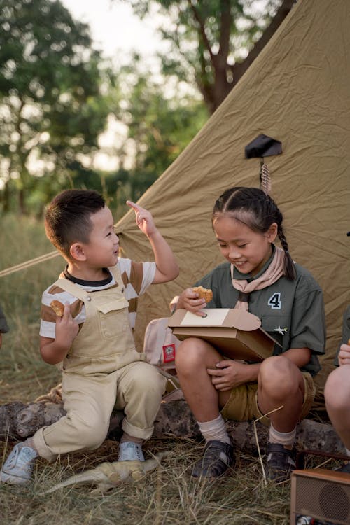 Photograph of Kid Scouts Eating Cookies