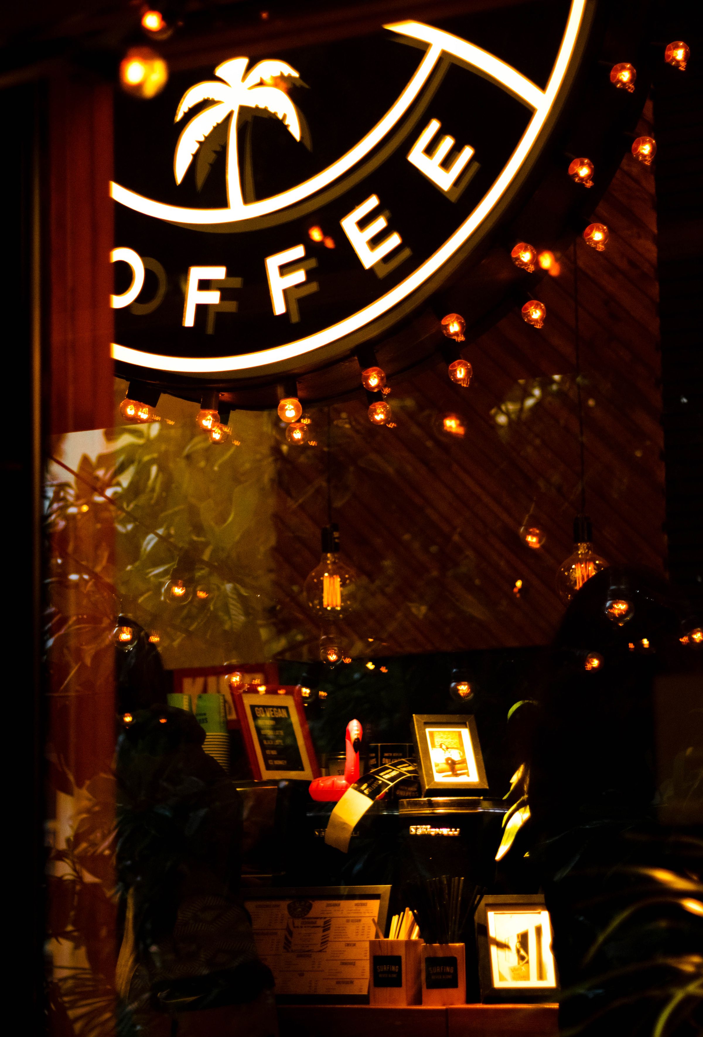 Warm interior of Raseef coffee house at dusk