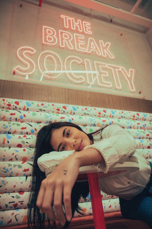 Young Brunette Woman Lying on the Table 