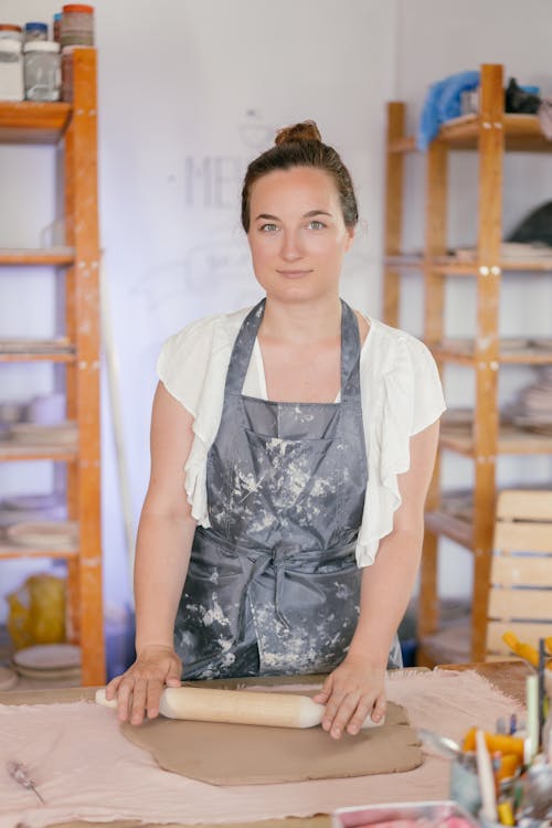 Woman Holding a Rolling Pin