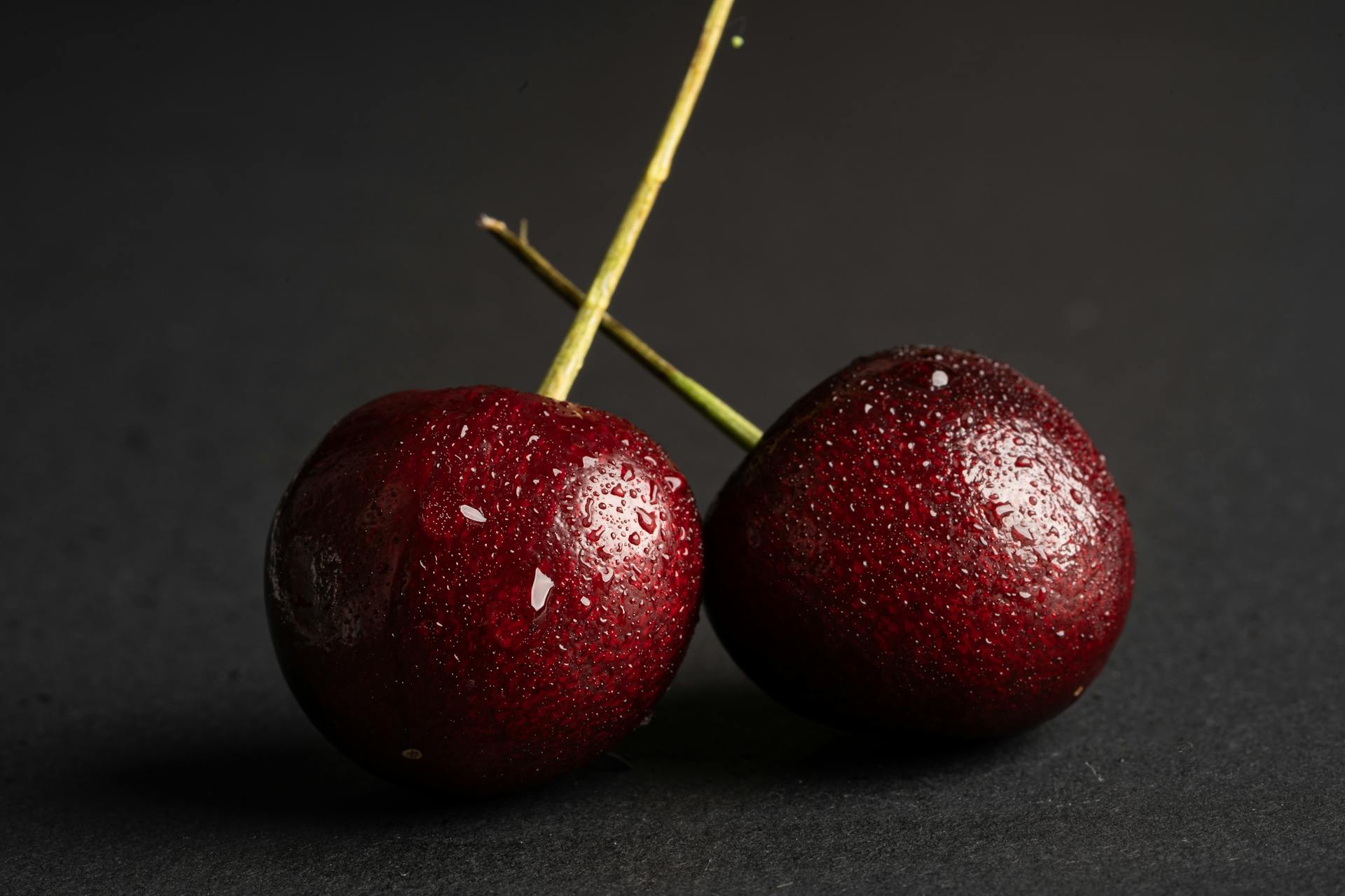 Close-Up Photograph of Wet Cherries