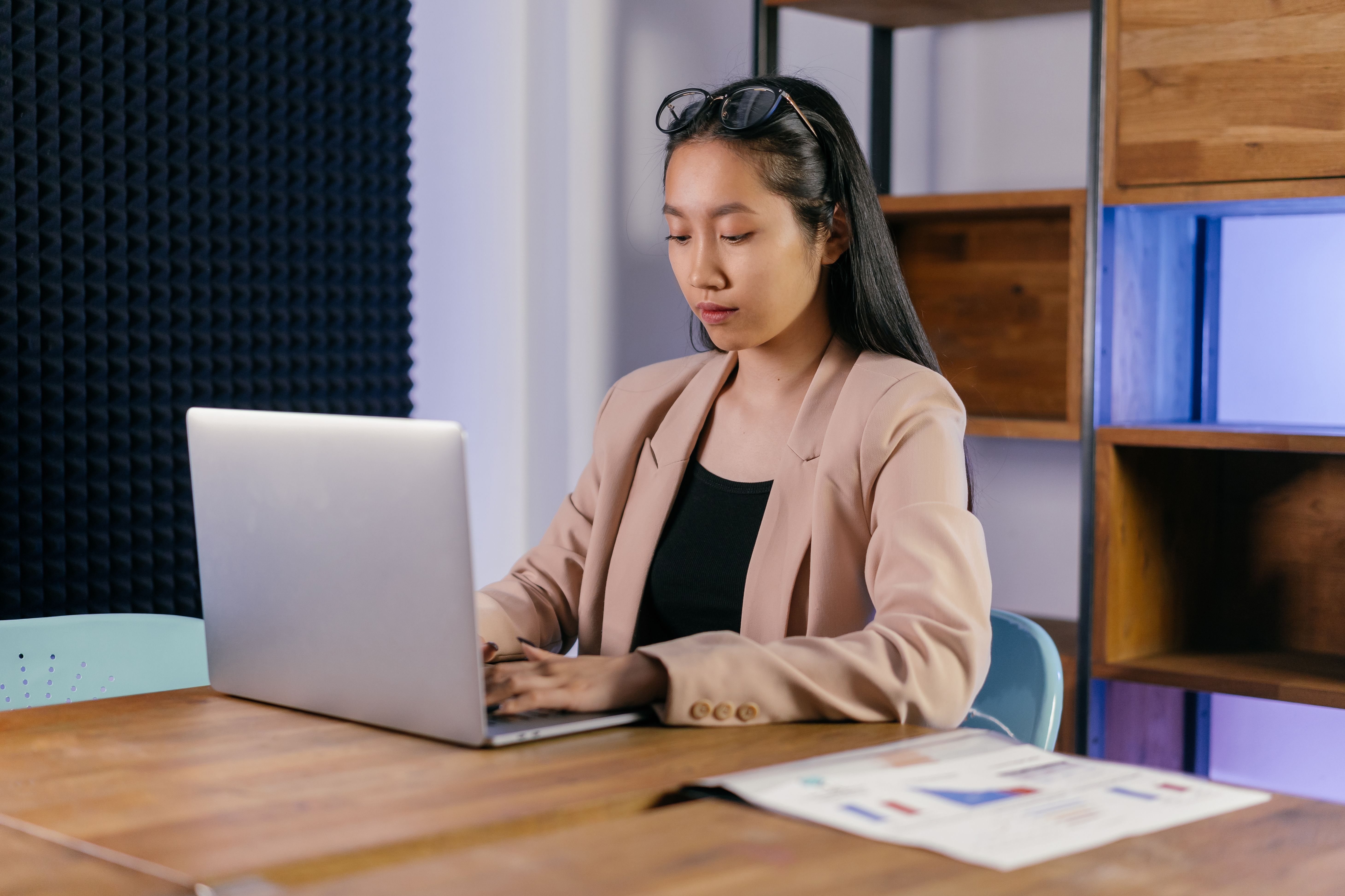 Professional woman working at a laptop