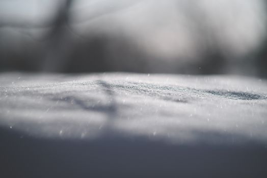 Tranquil winter landscape of pure snow in soft focus, evoking calm and serenity.