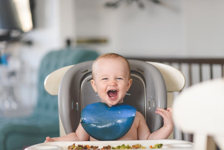 Happy Little Boy Eating 