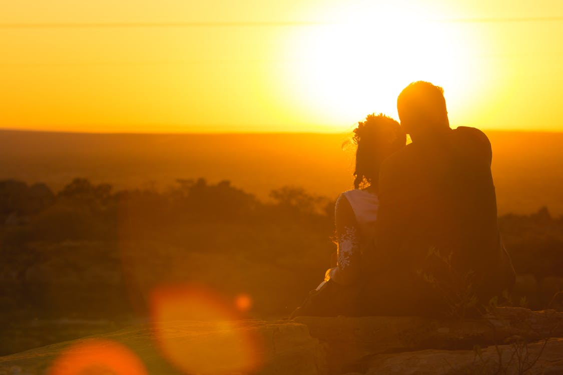 Free stock photo of couple hugging, evening sun, wedding photography