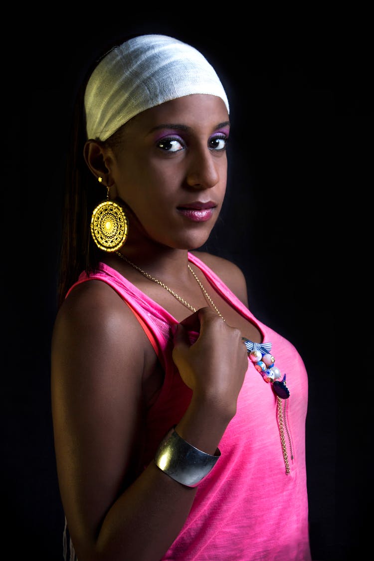 Woman In Pink Tank Top Wearing Bandana