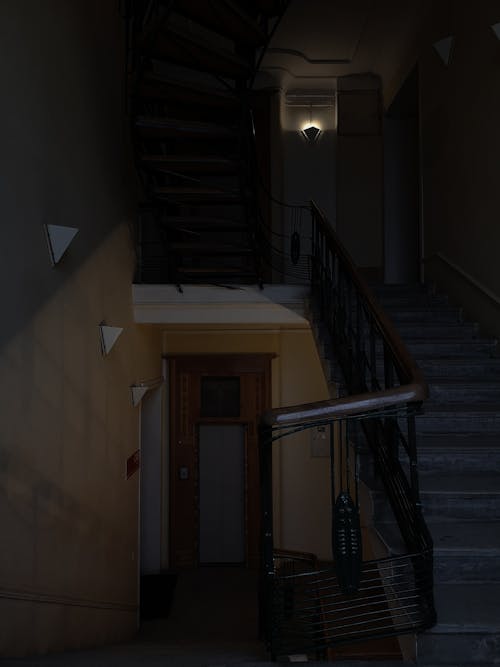 A Wooden Door Near the Stair Case