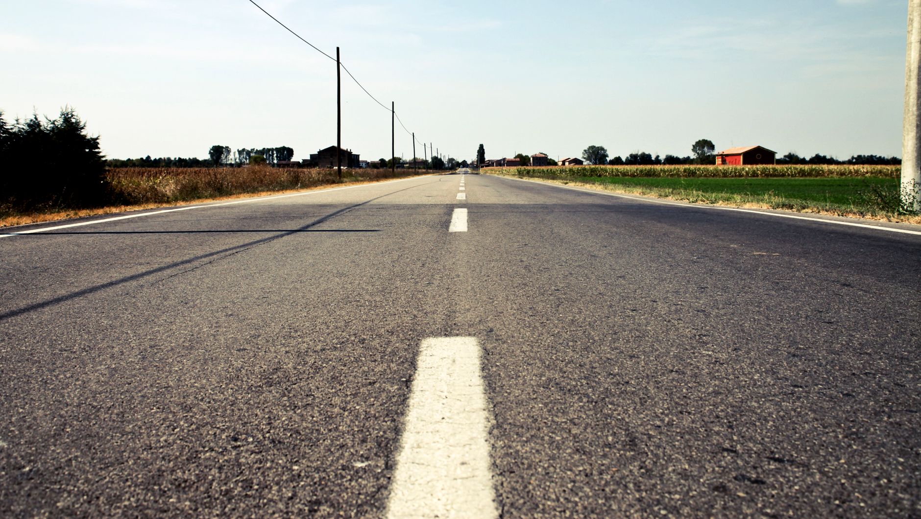 Rural farmland and a two-lane road in Orlinda, Tennessee