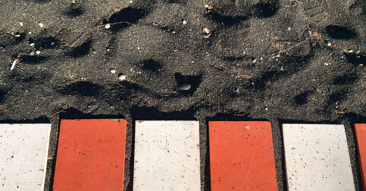 Perissa, the black volcanic sand beach of Santorini