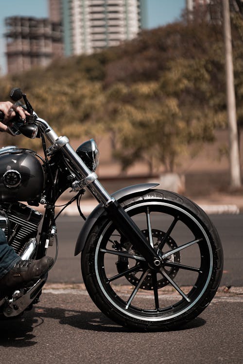 A Person Riding Black and Silver Motorcycle