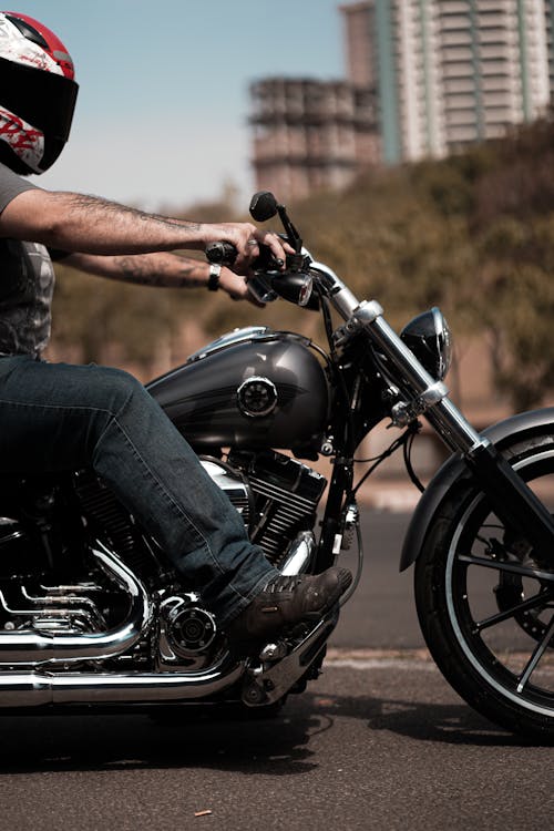 Man Riding a Black Motorcycle