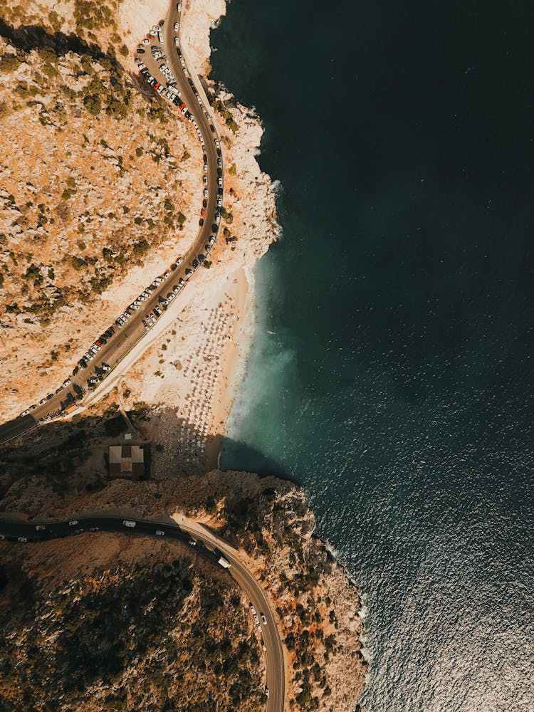 A Winding Road Near The Ocean