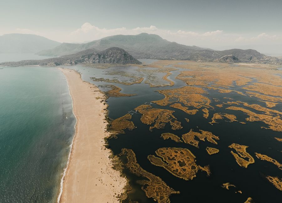 A breathtaking aerial view of Dalyan's Turtle Beach, showcasing its unique landforms.