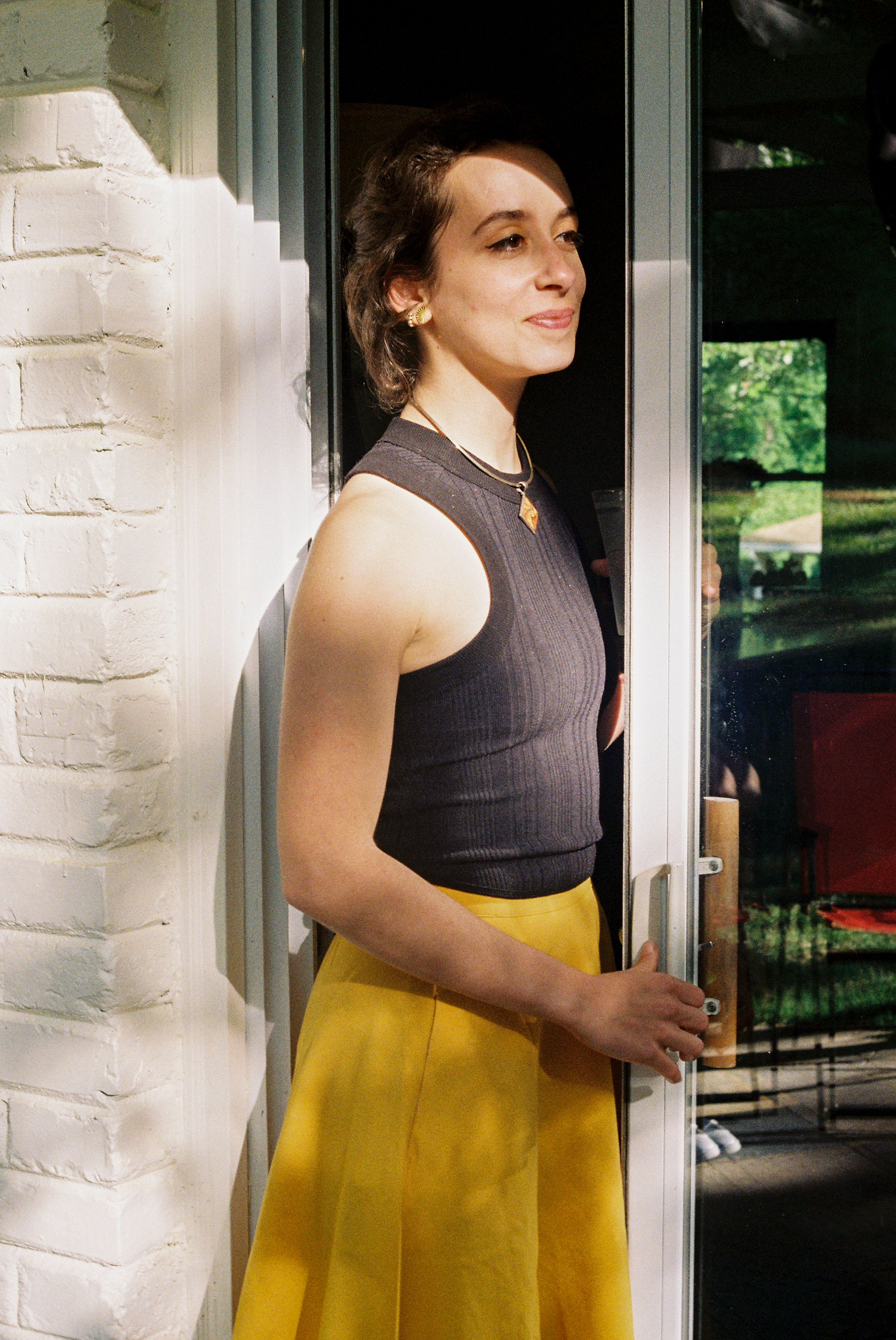 Woman in Black Top and a Yellow Skirt · Free Stock Photo