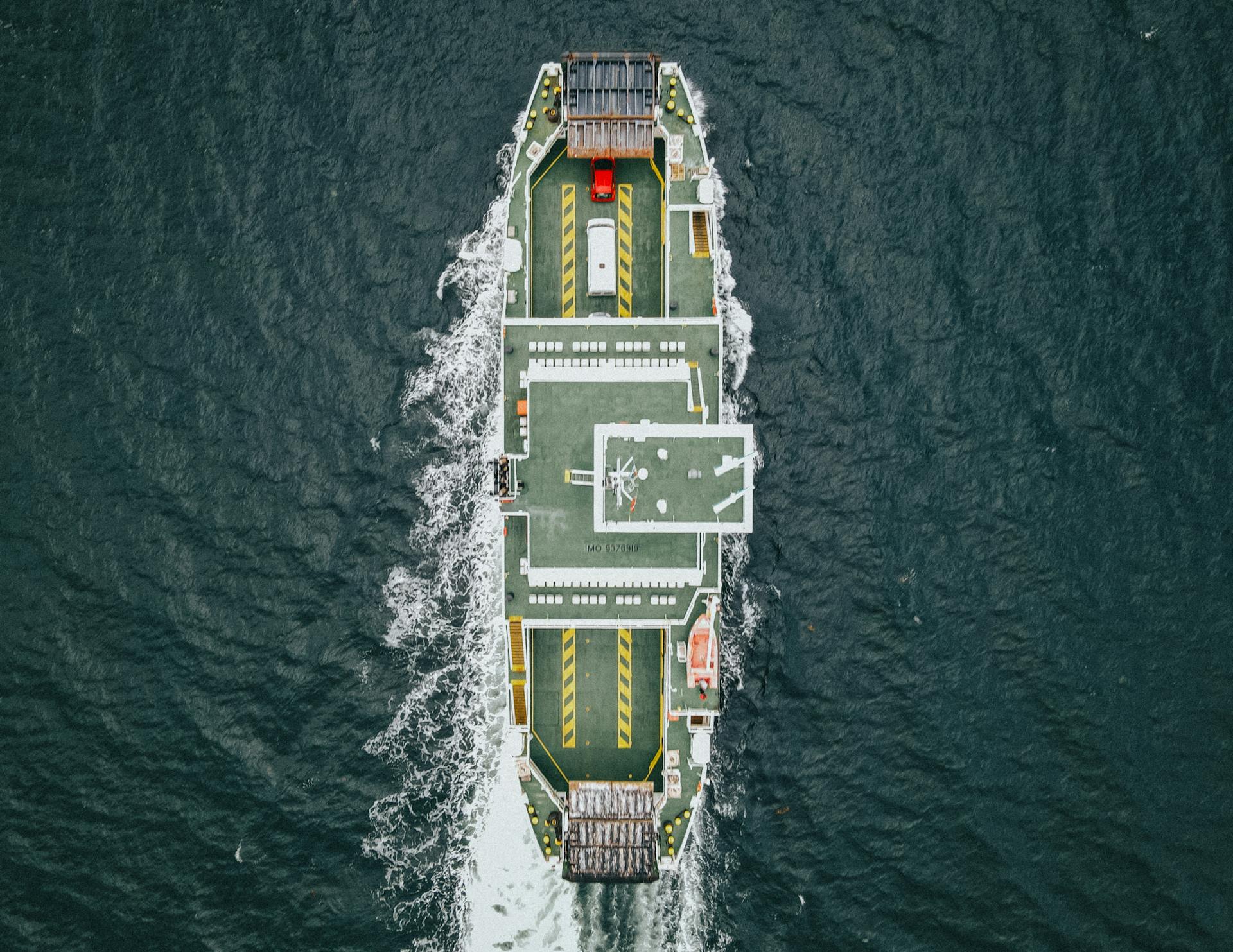 Drone shot capturing a ferry in North Ayrshire, Scotland.