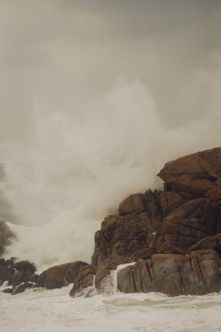 Wave Hitting Rock