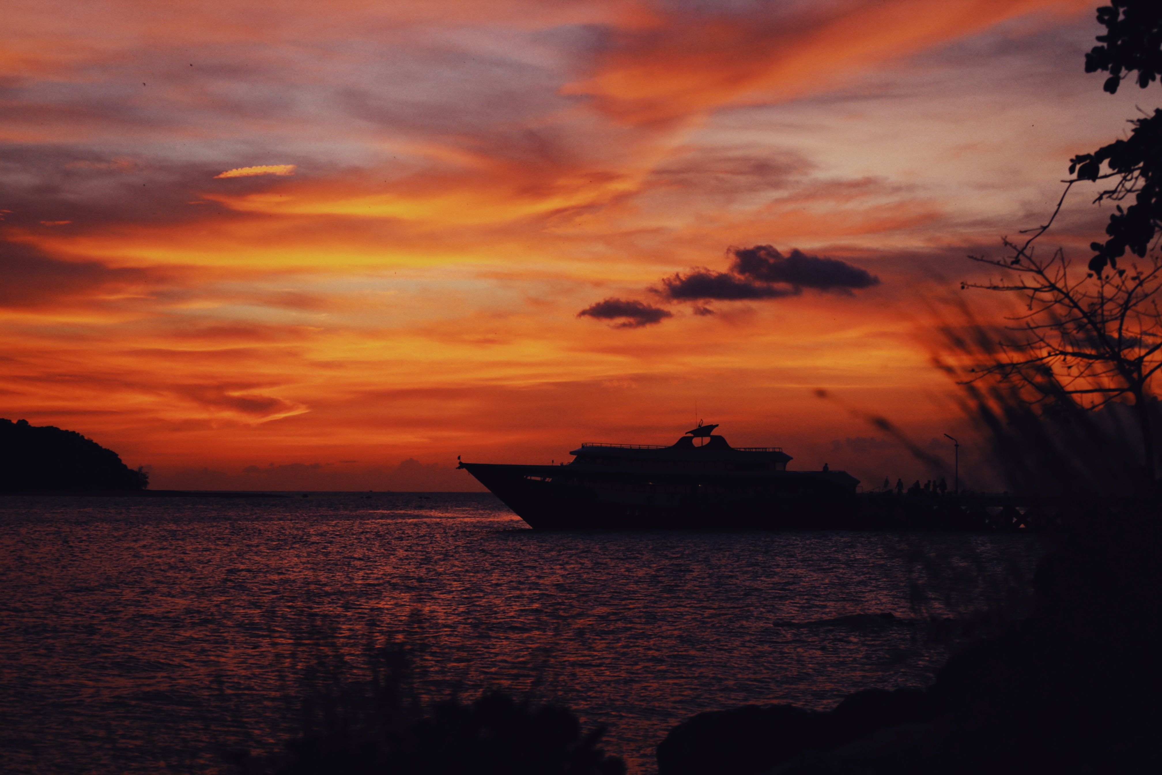 Silhouette of Boat Sailing on the Sea during Sunset · Free Stock Photo