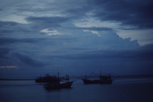 Fishing Boats under Ovecast Sky