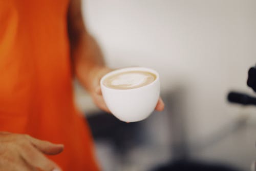 Free Person Holding a Cup of Coffee  Stock Photo